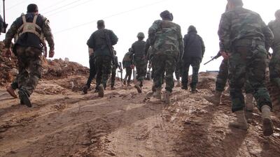Kurdish Peshmerga walk to the frontline in Shandoukhah in northern Iraq as Iraqi Kurdish fighters retake territory from ISIL militants. The Iraqi military has deployed thousands of soldiers in northern Iraq as it prepares to recapture Mosul from ISIL's hands. AP Photo/Vivian Salama