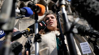 Stella Assange, wife of Wikileaks founder Julian Assange, arrives at the Royal Courts of Justice in London. Her husband awaits a ruling on his right to appeal against extradition to the US to face espionage charges. AP