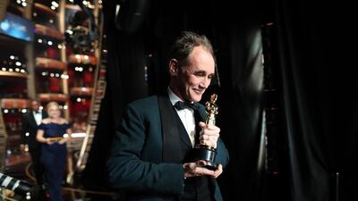 Mark Rylance, winner of Best Supporting Actor for Bridge of Spies, walks offstage. AFP