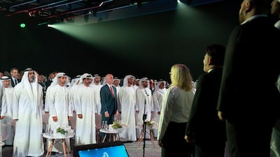 From left: Major General Sheikh Khaled bin Mohamed bin Zayed, Deputy National Security Adviser, member of the Abu Dhabi Executive Council and Chairman of Abu Dhabi Executive Office; Sheikh Khaled bin Zayed Al Nahyan, Chairman of the Board of Zayed Higher Organization for Humanitarian Care and Special Needs (ZHO); Sheikh Hamed bin Zayed Al Nahyan; Sheikh Mohamed bin Zayed; Faisal Al Bannai; and Lt General Sheikh Saif bin Zayed, UAE Deputy Prime Minister and Minister of Interior, stand for the UAE national anthem, during the inauguration of the EDGE advanced technology group. Hamad Al Mansoori for the Ministry of Presidential Affairs