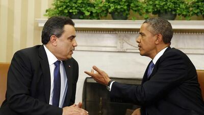 Barack Obama and Tunisia's prime minister Mehdi Jomaa in the Oval Office. Mr Jomaa was the first Tunisian leader to visit Washington since 1990. Larry Downing / Reuters / April 4, 2014