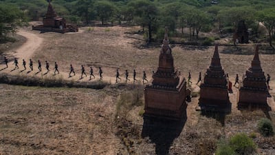 Members of a police squad patrolling a temple complex in Bagan, Mandalay Region, Myanmar. AFP