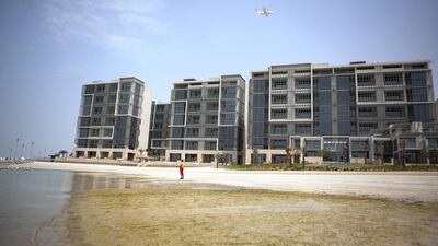 Al Raha Beach apartments: Q2 up 4%. 1BR: Dh100-120,000. 2BR: Dh135-165,000. Dh180-240,000. Q2 2013-Q2 2014 up 6%. Silvia Razgova / The National