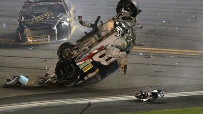 A view of the wreckage from the crash following the chequered flag on Monday morning at the Nascar Coke Zero 400. Patrick Smith / Getty Images / AFP