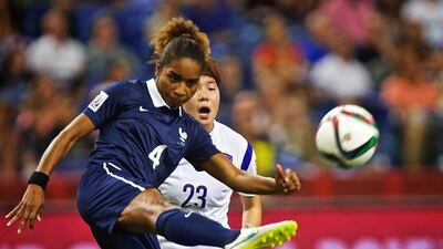 Laura Georges, left, is France's most capped player and has appeared in three World Cups. Andre Pichette / EPA / June 21, 2015