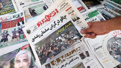 An Iranian newspaper's front page reads 'Knife in the neck of Salman Rushdie', a day after a Lebanese-American man Hadi Matar stabbed the British author. AFP