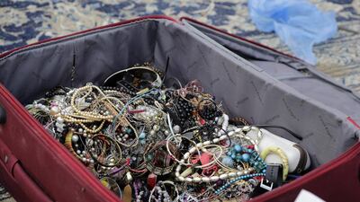 One man came with a suitcase full of beaded jewellery and sold the whole bag to an auction winner, who had just a few moments to inspect its contents before buying.