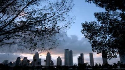 The sun sets over Dubai Marina. Dubai wants the Federal Government to provide loans to capital-starved companies, according to a British newspaper.