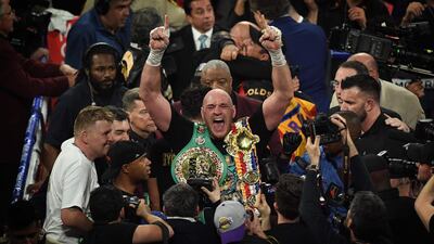 Tyson Fury celebrates after beating Deontay Wilder. AFP