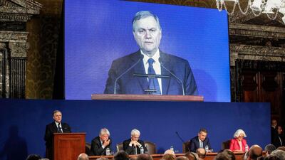 Bank of Italy Governor Ignazio Visco, standing at left and seen on giant screen, in an annual speech on the state of the Italian economy, Visco said that "Italy's destiny is that of Europe," as political uncertainty threatens to drag the eurozone's number 3 economy into a new crisis. Giuseppe Lami/AP
