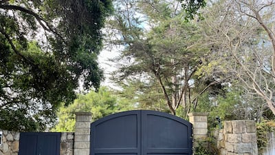 The gate to the couple's estate. Photo: Troy Cooper