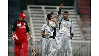 UAE’s Fahad Al Hashmi celebrates the departure of Oman’s Nadil Yousuf during the Gulf Cup Final at the Sharjah Cricket Stadium last night. The UAE eventually won on a second single over eliminator.
