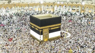 Muslim pilgrims circumambulate the Kaaba at the Masjid Al Haram Mosque in Mecca, Saudi Arabia. Omer Saleem / EPA
