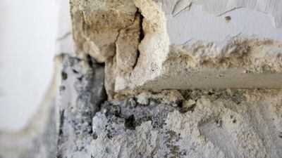 Individual layers of paint and render have been removed from the intricate ‘polylobe’ features that decorate the archways in Qasr Al Hosn’s internal facade. Originally, the polylobes were believed to date from the 1980s, but investigation has revealed layers of turquoise paint from the 1960s and render from the 1940s that prove these features are original. Christopher Pike / The National