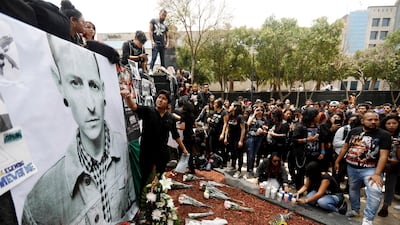 Fans gather at Revolucion monument to pay tribute to Chester Bennington, Linkin Park frontman, following the singer's death by suicide, in Mexico City, Mexico. Edgard Garrido / File Photo / Reuters