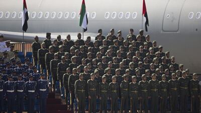 At a graduation ceremony at Al Ain's Khalifa bin Zayed Air College, members of the Armed Forces stand to attention. Donald Weber / Crown Prince Court - Abu Dhabi