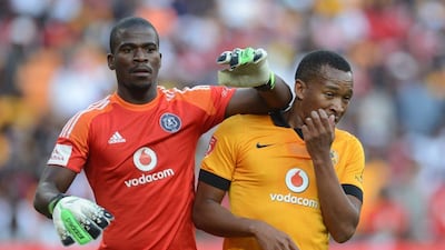 Senzo Meyiwa, the South Africa and Orlando Pirates goalkeeper, left, was shot dead on Sunday night. Lefty Shivambu / Gallo Images / Getty Images