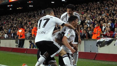 Valencia’s striker Santi Mina (R) jubilates his goal against FC Barcelona during the La Liga match played at Camp Nou stadium in Barcelona, Catalonia, Spain on 17 April 2016. EPA/MARTA PEREZ