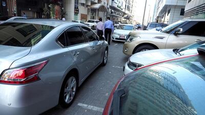 In certain areas across the capital, like Al Ziyani, drivers struggle to find parking spaces. Delores Johnson / The National