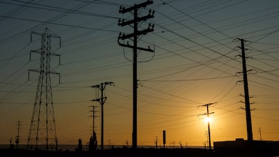 Power poles in the early morning in Commerce, California. Reuters
