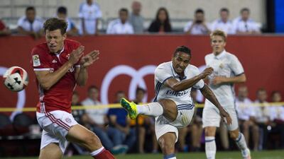 Real Madrid’s Danilo (C) scores past Bayern Munich’s Nicolas Feldhahn during the International Champions Cup match betweeen FC Bayern Munich and Real Madrid CF August 3, 2016 at MetLife stadium in East Rutherford, NJ. Don Emmert / AFP