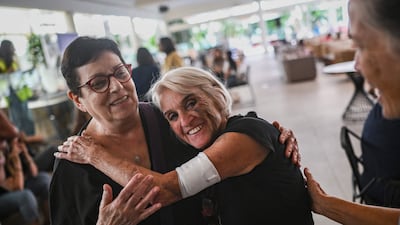 An injured woman at a hotel in Eilat, which is hosting survivors from the Israeli kibbutz of Nir Oz. AFP