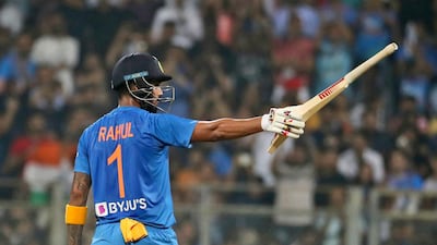 KL Rahul raises his bat after reaching 50 in the third Twenty20 against the West Indies. AP