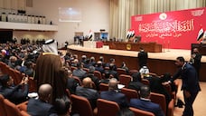 Newly elected politicians attend the parliament’s first session in Baghdad. AFP