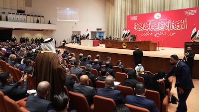 Newly elected politicians attend the parliament’s first session in Baghdad. AFP