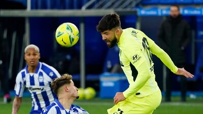 Atletico Madrid's Felipe heads the ball. Reuters