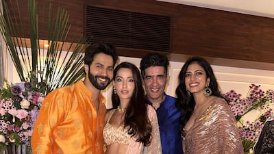 Varun Dhawan, Nora Fatehi, Manish Malhotra and Malavika Mohanan. Photo: Instagram / manishmalhotra05