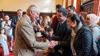 King Charles visits Aberdeen Town House in October 2022 to meet families from Afghanistan, Syria and Ukraine who have settled in the Scottish city. Getty Images