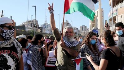 Supporters of Lebanese leftist parties protest in support of the Palestinians in Jerusalem, as they march from Mar Elias camp to the Chatila Palestinian camp in Beirut, Lebanon. EPA