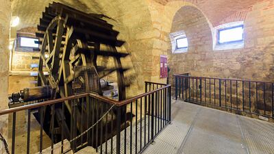 The Pilsen medieval network of vaulted subterranean tunnels stretches for more than 12 miles and contains replicas of former features, such as this water wheel. Alamy