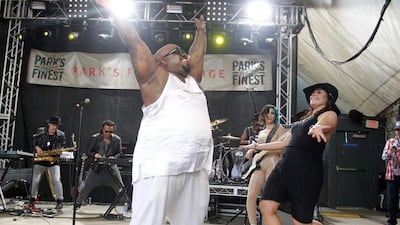 Rachael Ray, right, greets CeeLo Green onstage at her Feedback Party during the SXSW Music Festival on March 15, 2014, in Austin, Texas. Jack Plunkett / Invision / AP