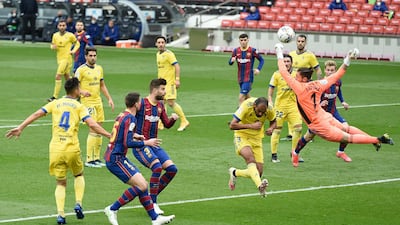 Cadiz goalkeeper Jeremias Ledesma attempts a save. AFP