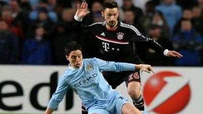 City faced Bayern Munich, Villarreal and Napoli last season and failed to qualifty. Paul Ellis / AFP