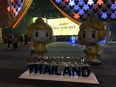 Nations celebrating placed gold 2022 balloons outside their pavilions. Nicholas Webster / The National