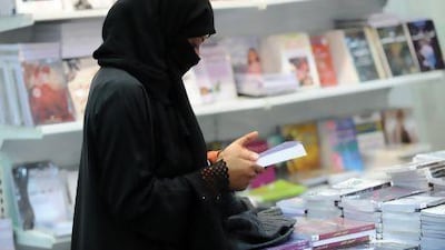 A Saudi woman attends the annual International Book Exhibition in Riyadh. The push and pull over women’s rights illustrates the process of reform in the kingdom.