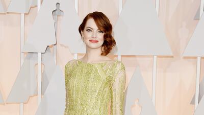 Emma Stone at the 87th Academy Awards ceremony in 2015, wearing a custom Elie Saab gown. The dress is one of the highlights of the upcoming To Beirut With Love auction. Courtesy Sotheby's