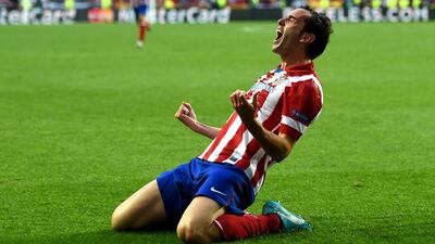 Diego Godin celebrates scoring the opening goal during the UEFA Champions League Final against Real Madrid. Shaun Botterill / Getty