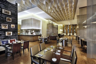 The Grill has an open yet soundproofed kitchen