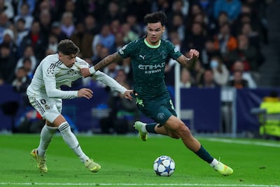 Manchester City's Nico O'Reilly, right, in action against Real Madrid's Fede Valverde. EPA