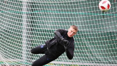 Jordan Pickford dives to make a save. Getty Images