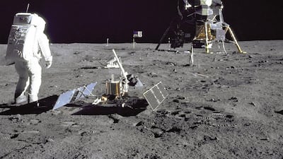 Aldrin stands besides a lunar seismometer. NASA / EPA