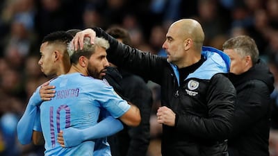Manchester City's Sergio Aguero with manager Pep Guardiola as he was substituted for Gabriel Jesus. Reuters
