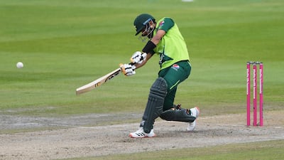 Pakistan batsman Babar Azam hits a boundary on his way to 56. Getty