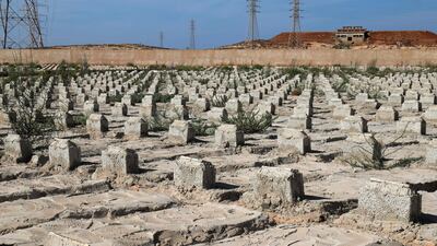 Graves of flood victims recovered by Libya's National Authority for the Search and Identification of the Missing, in a cemetery in the eastern port city of Derna. AFP