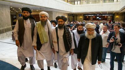 Mullah Abdul Ghani Baradar, the Taliban's top political leader, third from left, has been leading negotiations on behalf of the insurgent group. AP Photo