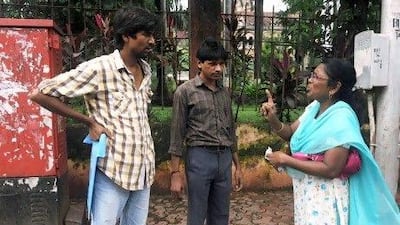Rajeshree Rajaram Kamble tells off a man for spitting in the street in Mumbai which commands a 200 rupee (Dh1 fine. "Every day I fight with people," she said. "Nobody is interested in paying the fine." Indranil Mukherjee / AFP Photo